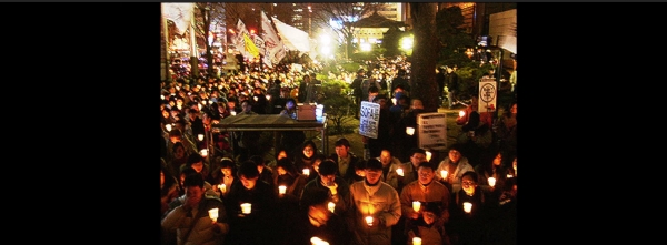 촛불 시위 현장에서 보이는 “SOFA를 전면 개정하라” 팻말 / 유튜브 평통사TV